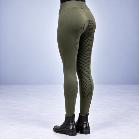 Light olive full seat silicone riding tights from behind, worn with jodhpur boots